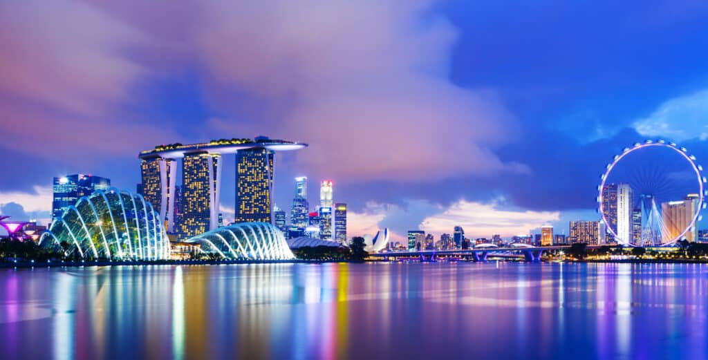 Singapore business district skyline at sunset. Image by ESB Professional, Shuttlestock