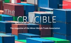 Section of the January cover of the Crucible magazine featuring containers and title
