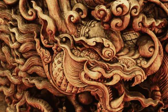 Carved wooden dragon, image by Oasishifi at Shuttlestock