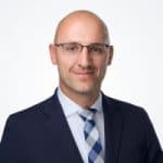 Thomas Feldmann, a man with glasses